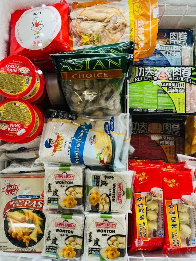 Frozen gyoza skins, wonton wrappers and hot-pot meats in the OKASHI Wrocław freezer